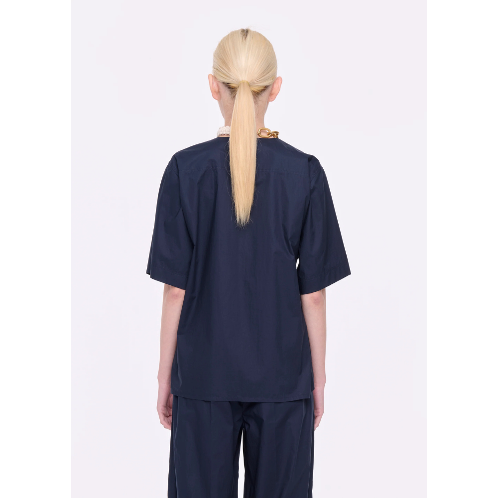 SHORT SLEEVE SHIRT WITH ASYMETRIC PANEL IN BLUE