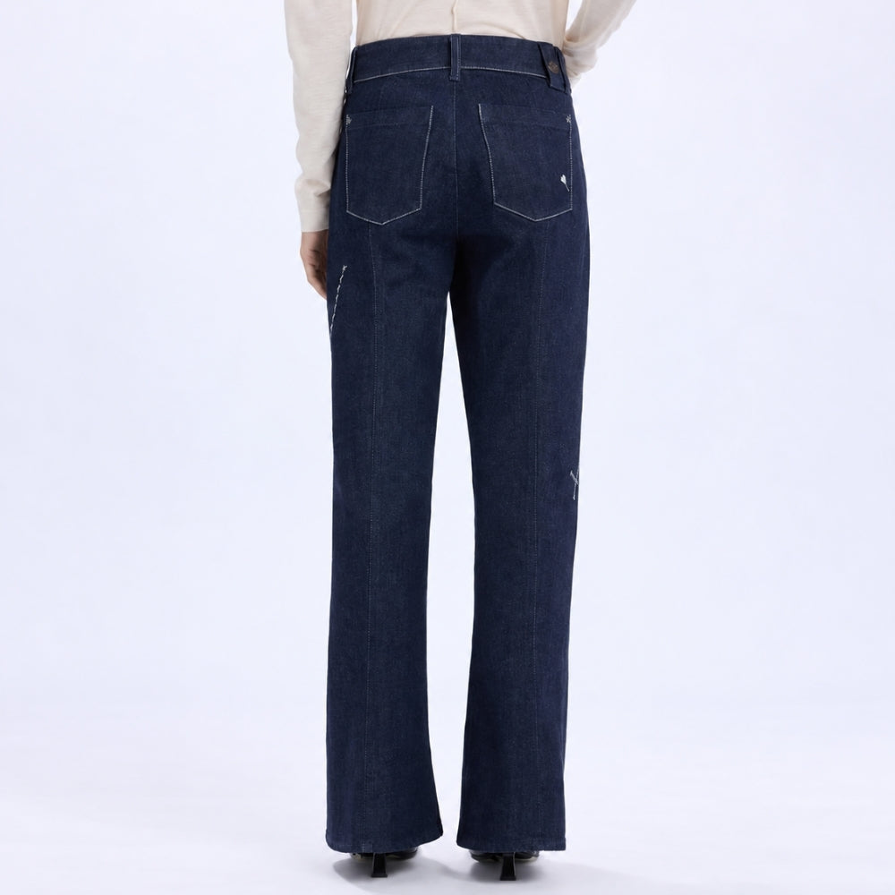 HIGH Everyday Couture Stardom bootcut jeans in deep blue denim with off-white geometric embroidery, back view