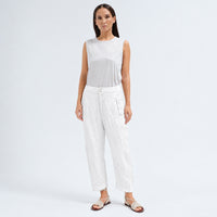 Transit Par Such comfort-fit trousers in white striped linen and cupro, with curved legs, a two-button waistband and flap pockets - model front view