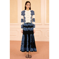 Shop Ulla Johnson Carina in Ocean, a blue seashell jacquard knit cardigan with round neck, long sleeves and button front. Available at Riada Australia.