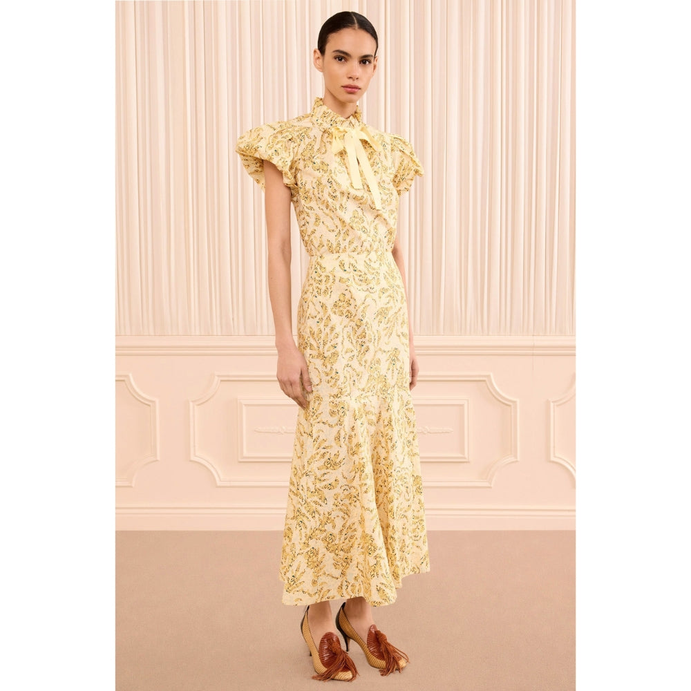 Riada Concept Ulla Johnson Clarisse high-waisted cotton poplin trumpet midi skirt in a pale yellow print - front view