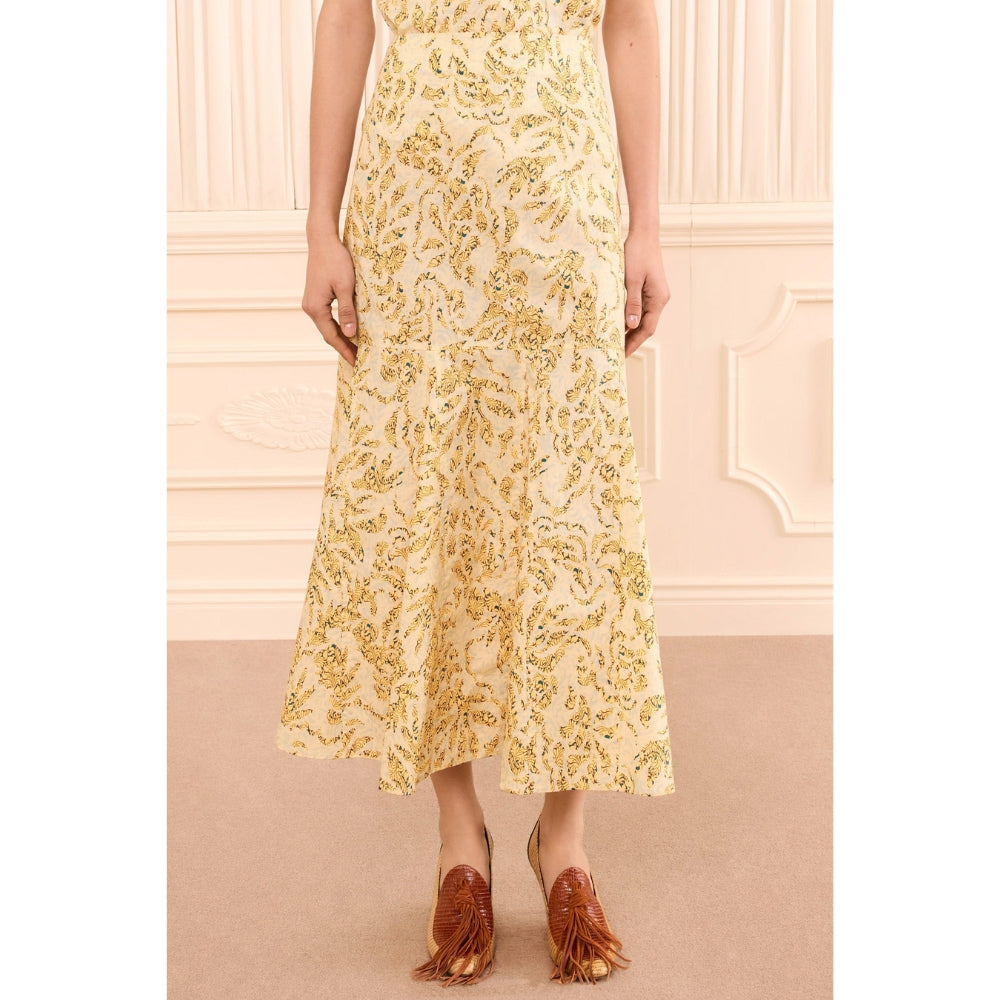 Riada Concept Ulla Johnson Clarisse high-waisted cotton poplin trumpet midi skirt in a pale yellow print - close up skirt
