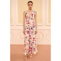 Shop Ulla Johnson Elowen in Summer Garden, a floral silk crepe de chine midi dress with V-neckline, bias cut and body-skimming fit at Riada Australia.