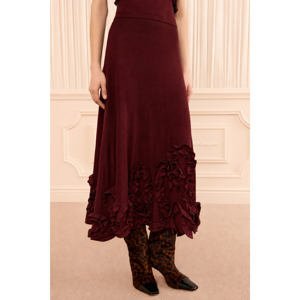 Riada Concept Ulla Johnson Heloise high-waisted wool jersey midi skirt in deep red, with ruffles at the hem - cropped model view