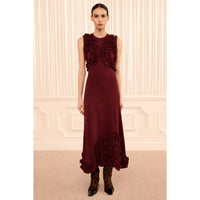 Riada Concept Ulla Johnson Heloise high-waisted wool jersey midi skirt in deep red, with ruffles at the hem - full front view styled model