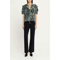 Riada Concept Ulla Johnson Josephine silk crepe de chine top in a blue paisley print, with ruffled sleeves and a tie neck - full body front