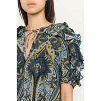 Riada Concept Ulla Johnson Josephine silk crepe de chine top in a blue paisley print, with ruffled sleeves and a tie neck - close-up view