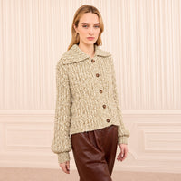Riada Concept Ulla Johnson Louise cardigan in a marled mouline knit with a wide collar and full sleeves - model front view