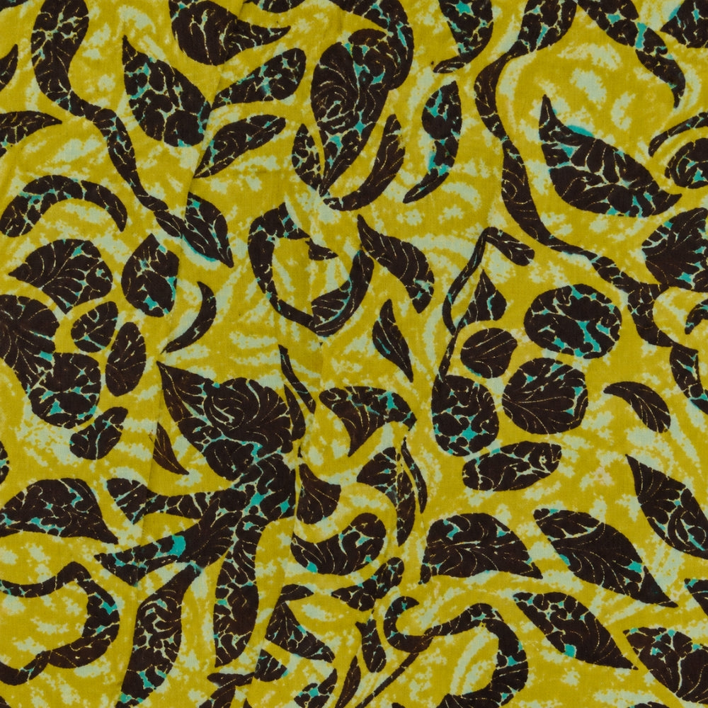 Riada Concept Ulla Johnson Othella cotton poplin midi dress in a chartreuse botanical print, with puff sleeves and pockets - close up fabric detail