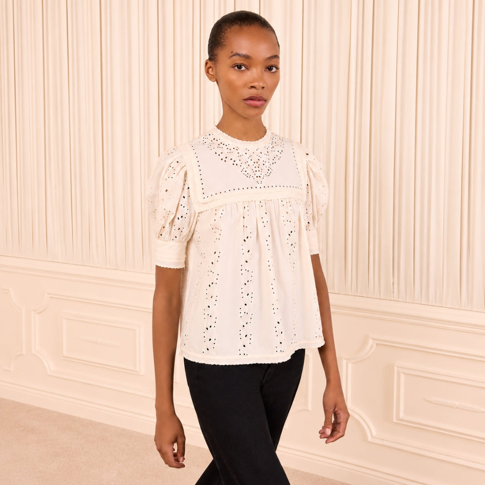Riada Concept Ulla Johnson Una ivory cotton poplin top with eyelet embroidery, an embroidered yoke and puff sleeves - styled model