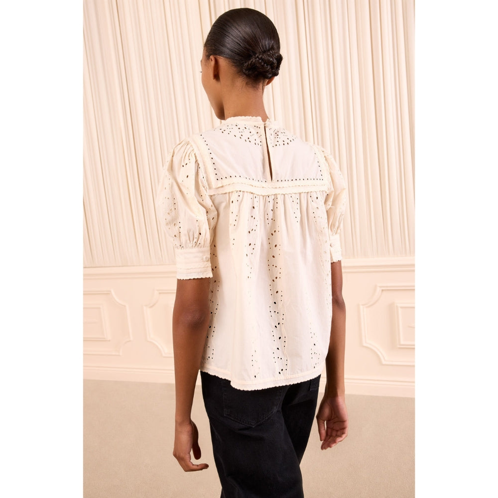 Riada Concept Ulla Johnson Una ivory cotton poplin top with eyelet embroidery, an embroidered yoke and puff sleeves - back view
