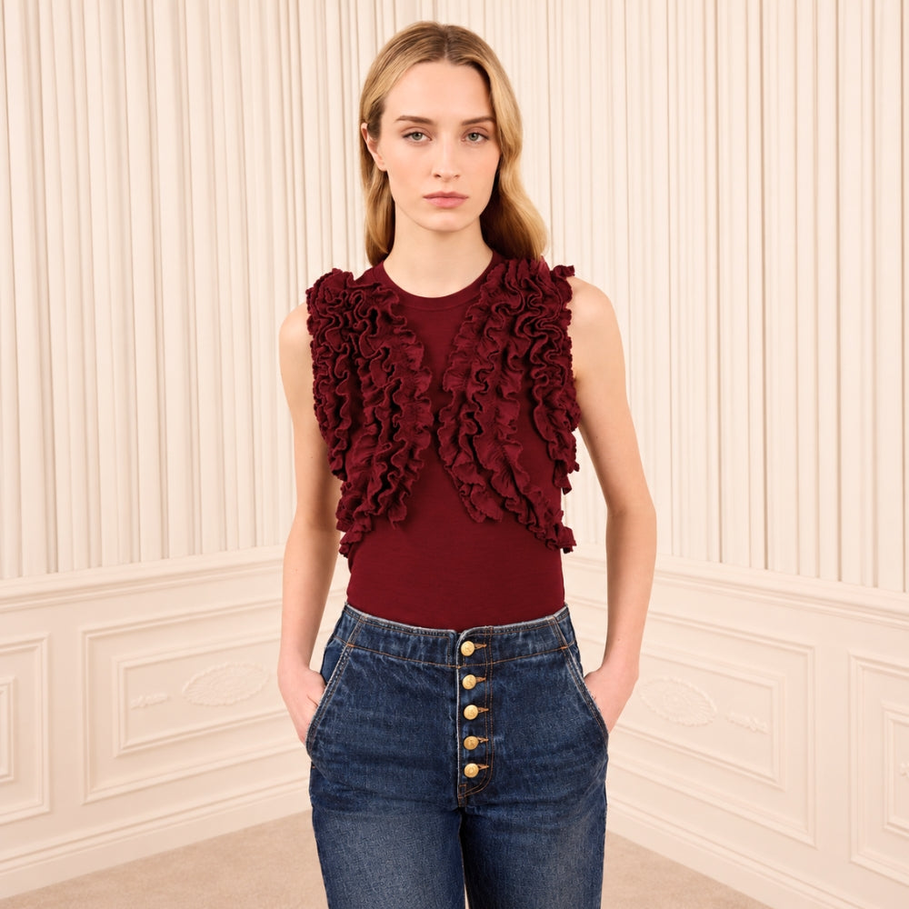 Ulla Johnson Vesna sleeveless wool jersey top in deep red, with ruffles tracing the bodice. Shop at Riada Concept, shipping Australia-wide and worldwide.