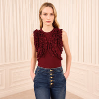 Ulla Johnson Vesna sleeveless wool jersey top in deep red, with ruffles tracing the bodice. Shop at Riada Concept, shipping Australia-wide and worldwide.
