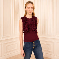 Riada Concept Ulla Johnson Vesna sleeveless wool jersey top in deep red, with ruffles tracing the bodice - styled model