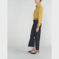 FRAME The Swing Jeans in Rinse at Riada Concept. High-rise cropped wide-leg jeans in rigid dark-indigo regenerative cotton - styled model video