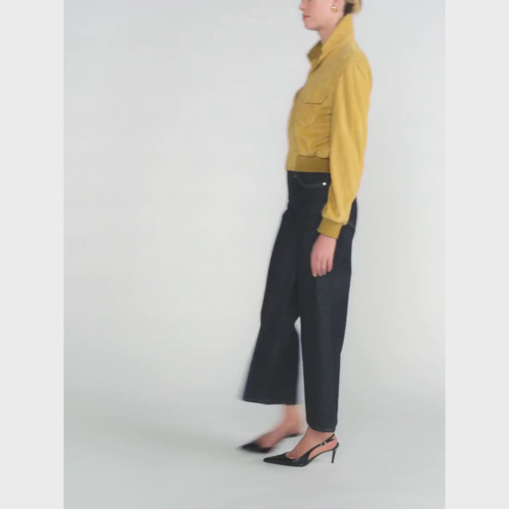 FRAME The Swing Jeans in Rinse at Riada Concept. High-rise cropped wide-leg jeans in rigid dark-indigo regenerative cotton - styled model video