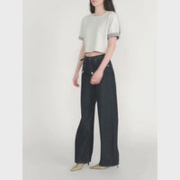 FRAME The Off Duty Drawstring Bow Jeans in Rinse at Riada Concept. High-rise fluid denim with a curved leg and drawstring waist - styled model video