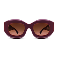 THIERRY LASRY Maroon sunglasses with brown lenses on a white background